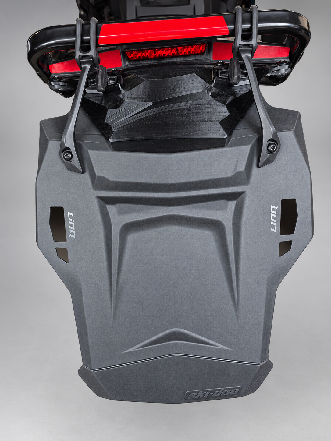 Rear view of the adapter and separately purchased Ski-Doo snowflap attached to a Catalyst M sled
